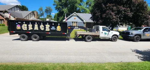 Grace Tree Service fleet of trucks and trailers
